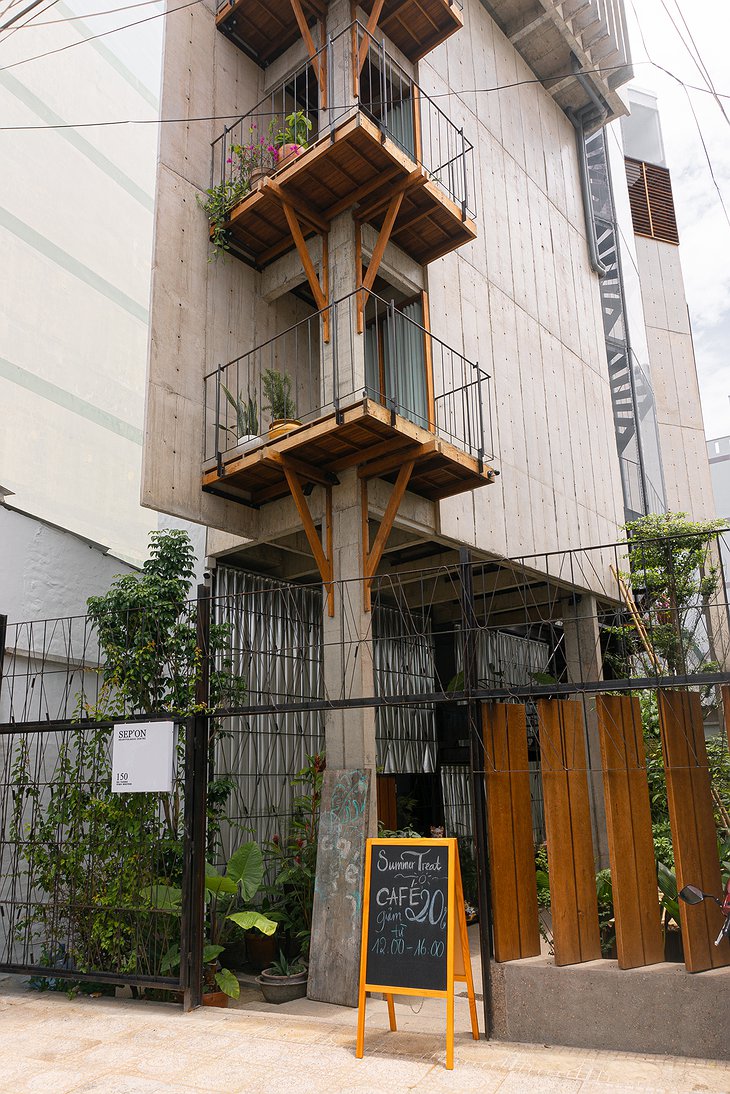 Sep'on Heartfulness Centre Concrete Tower With Wooden Balconies