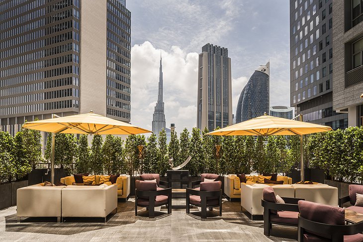 Four Seasons Dubai DIFC rooftop terrace with Burj Khalifa view