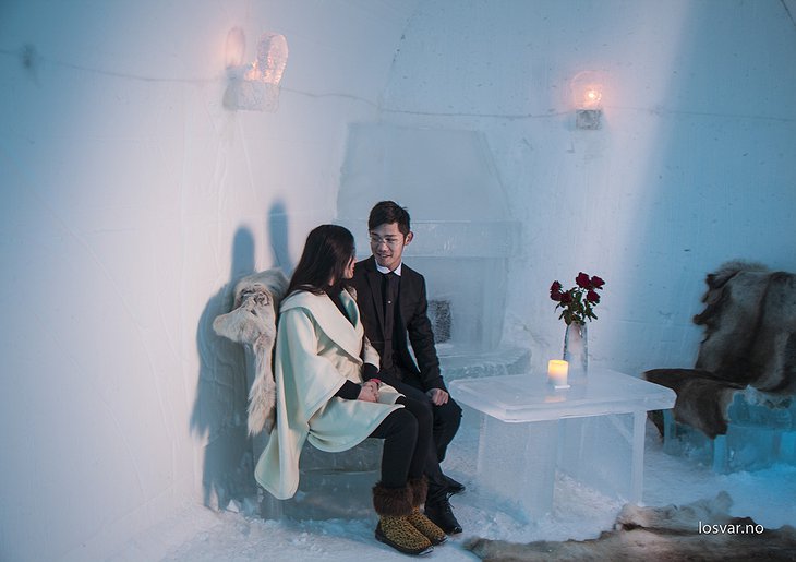 Asian couple in the igloo hotel room