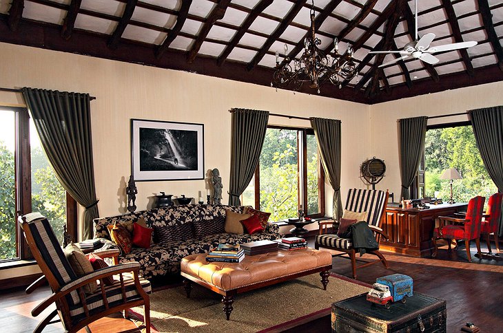 Samode Safari Lodge living room with wooden and leather furniture