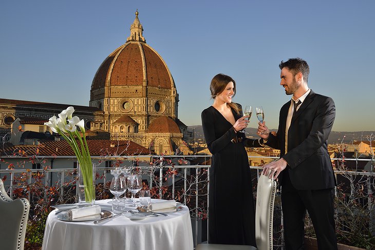 Hotel Brunelleschi rooftop terrace with romantic couple