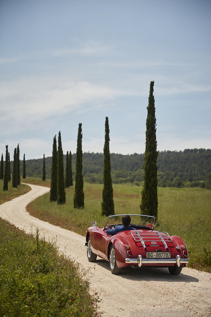 Tuscany Rural Road with a Classic Car