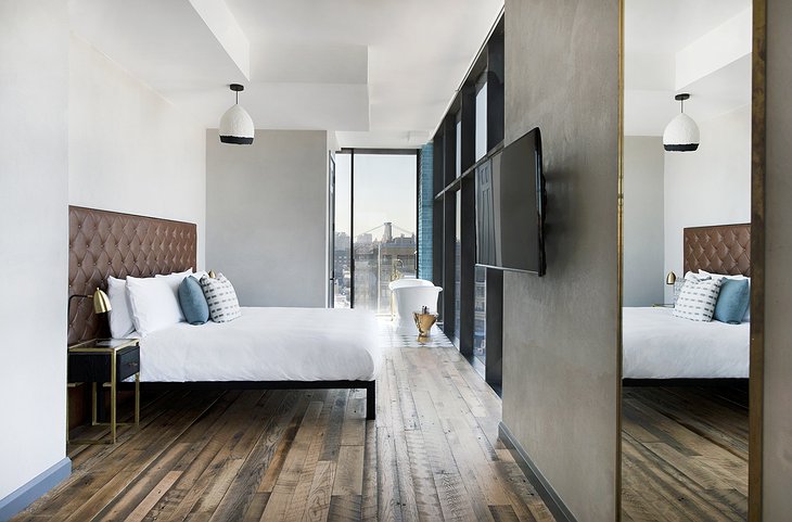 The Williamsburg Hotel bedroom with Brooklyn Bridge view
