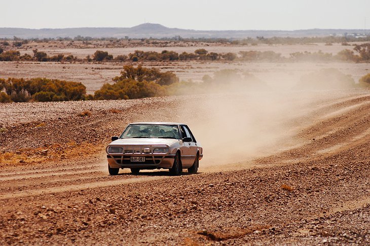 Car going in the Australian desert