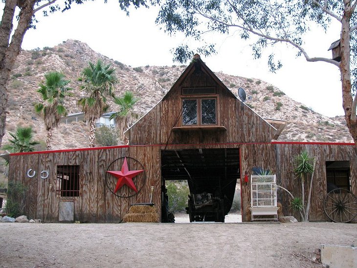 Genuine Draft Horse Ranch salon building with huge red star