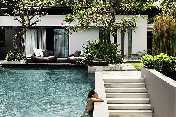Residence villa with a girl in the pool