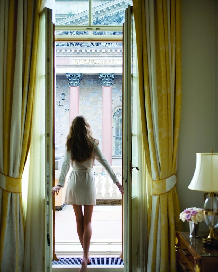 Four Seasons Hotel Lion Palace St. Petersburg with a Russian model girl posing in the room