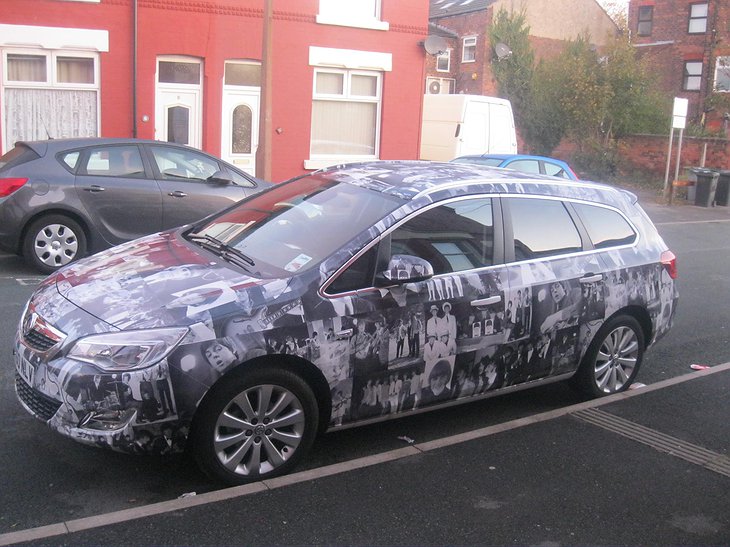 Vauxhall Astra with Beatles paintings
