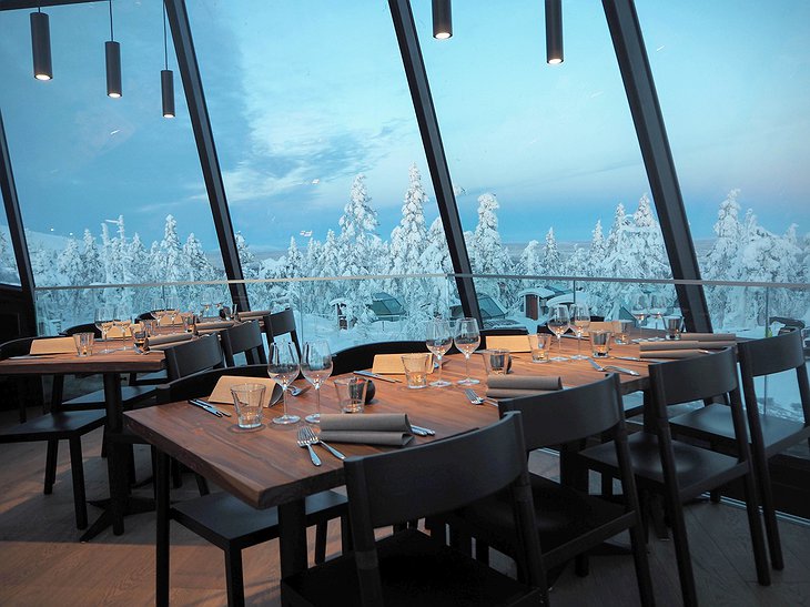 Levin Iglut restaurant with windows on the snowy nature