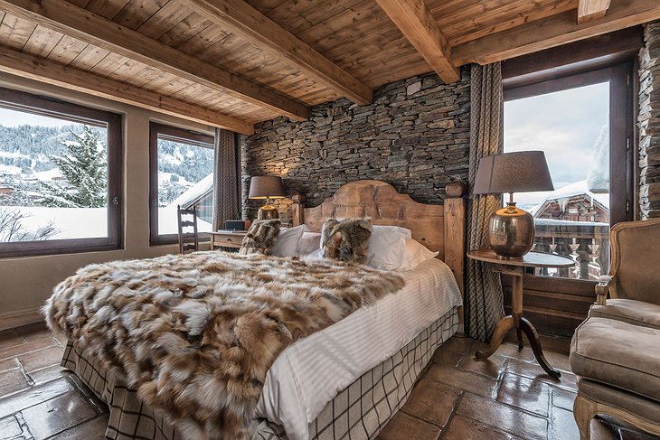 Les Fermes de Marie bedroom with snowy mountain views