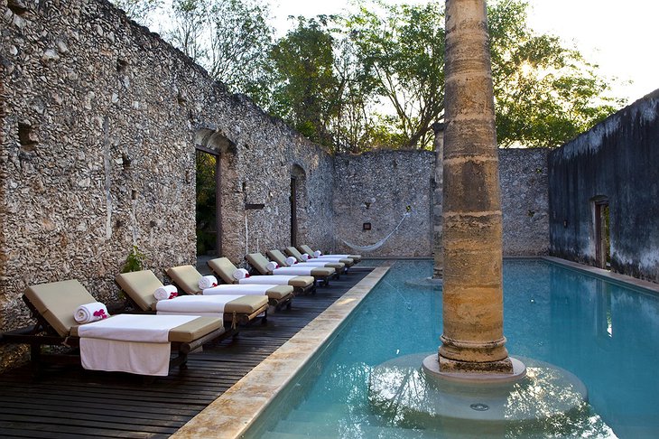 Hacienda Uayamon swimming pool with ancient walls