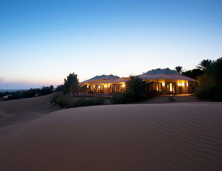 Al Maha Desert Resort tent at night