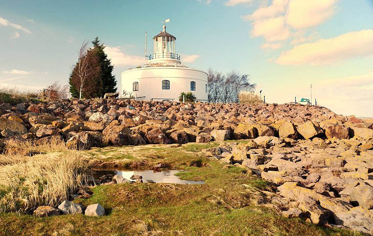 West Usk Lighthouse and the rocky beach