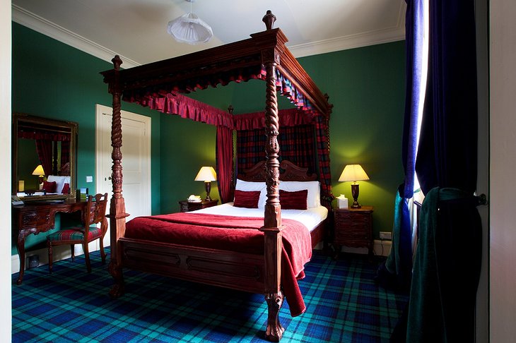 Tulloch Castle Hotel room with four-poster bed