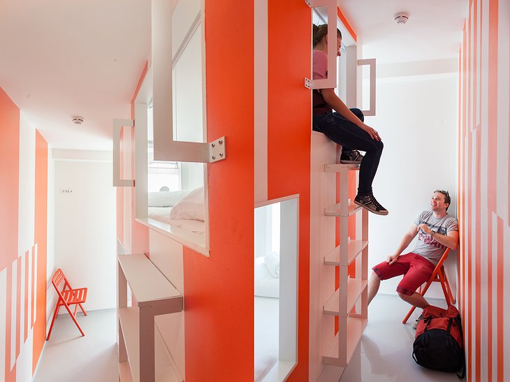 Boutique Hostel Forum orange and white chat room with people talking