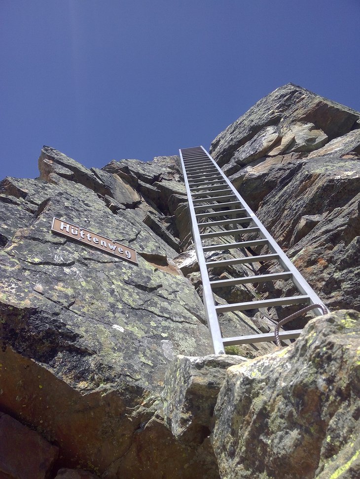Ladder on the rocks to climb up to the Mischabel Hut