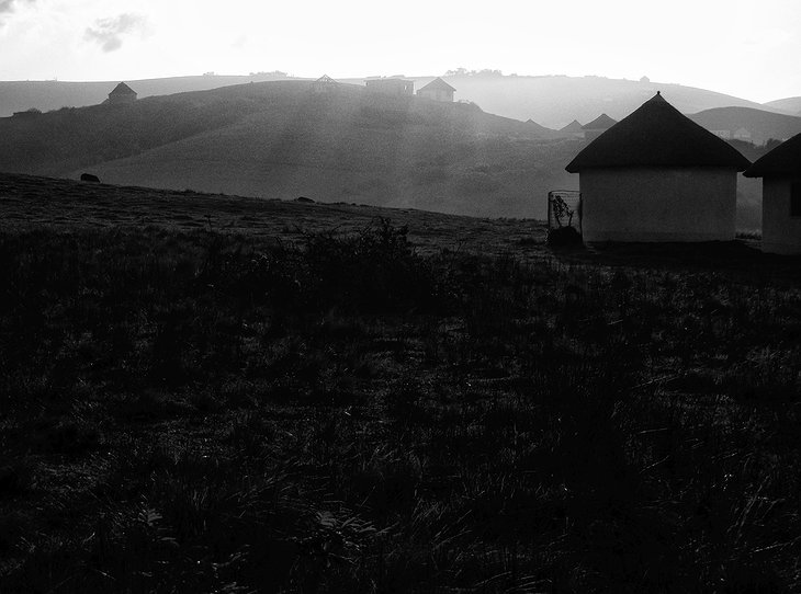 Bulungula Lodge huts in black and white