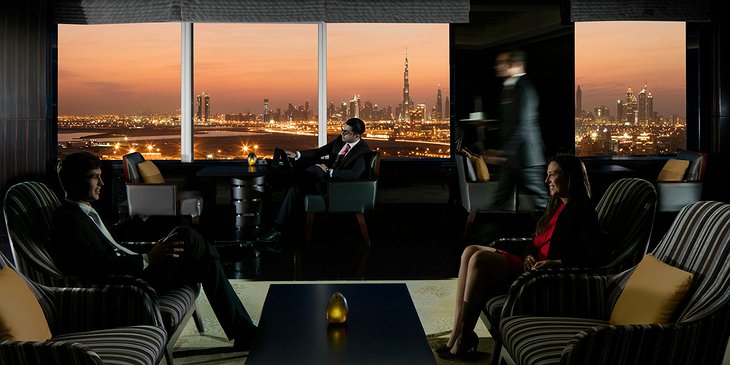 InterContinental Dubai Festival City bar at the evening with business people