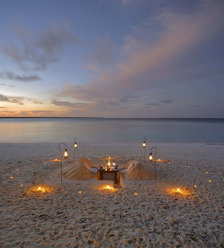 andBeyond Mnemba Island romantic dinner at the beach
