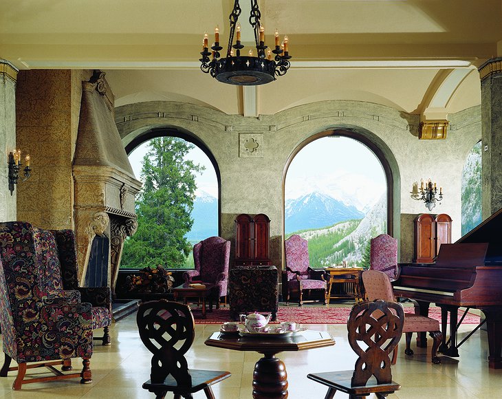 Fairmont Banff Springs Hotel room with piano and view to mountains