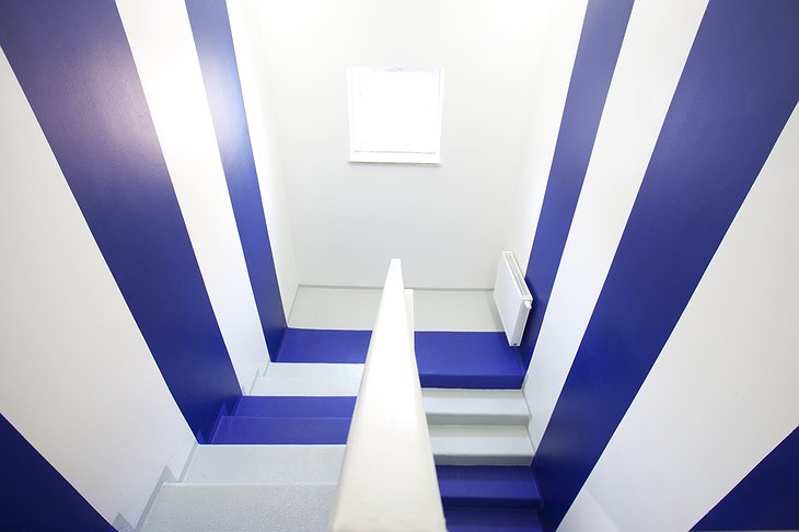 Boutique Hostel Forum blue and white stairs