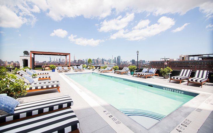 The Williamsburg Hotel rooftop pool with Manhattan panorama