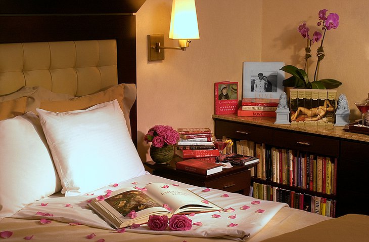 Library Hotel bed and books
