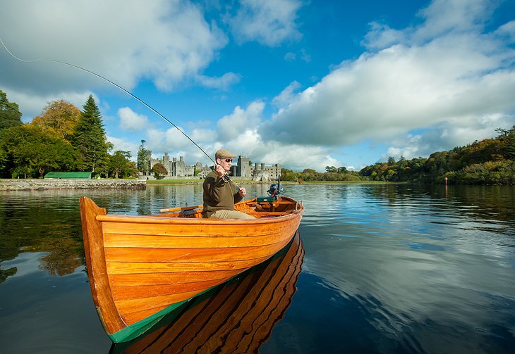 Fishing on the lake with Ashford Castle in the background