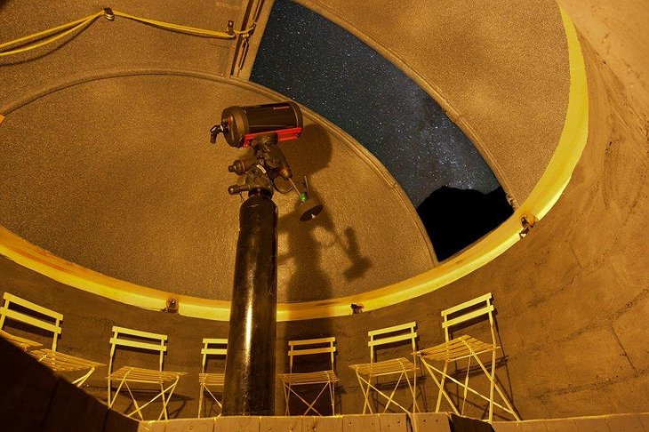 Gazing at the stars with the telescope from inside the tent of Elqui Domos