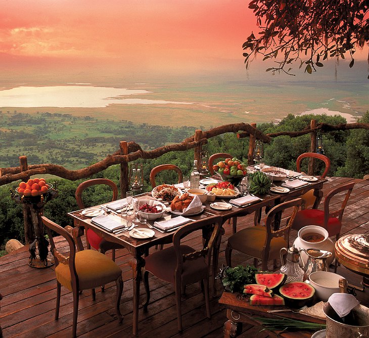 Dining on the terrace with spectacular views at Ngorongoro Crater Lodge