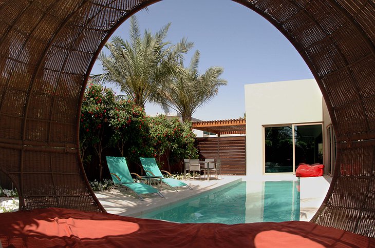 Desert Palm Resort Dubai pool villa hammock view