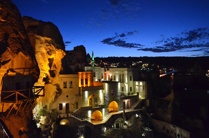 Cappadocia Cave Suites at night with view on Göreme