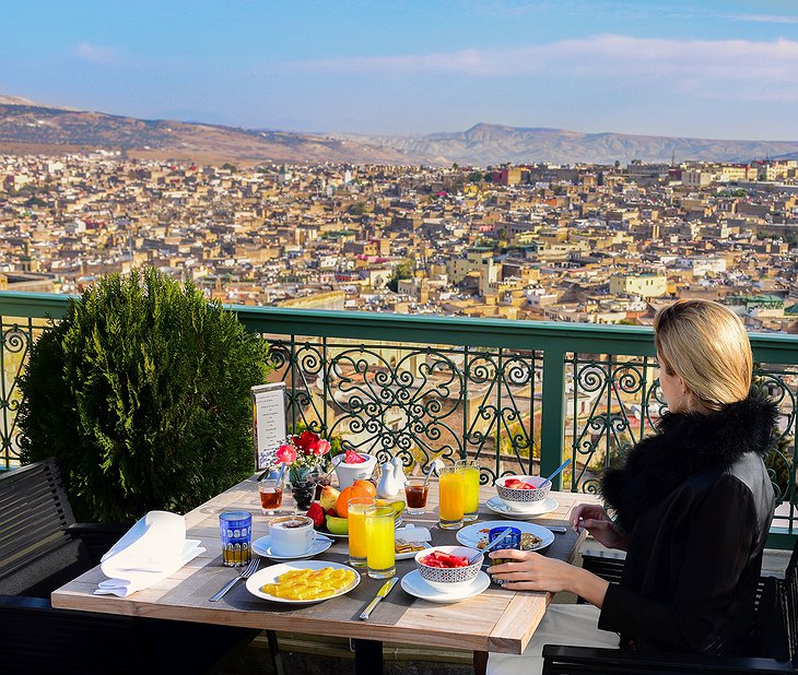 Palais Faraj terrace dining with Fes old town panorama