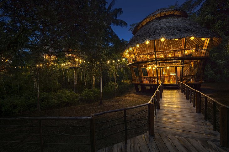 Treehouse Lodge Iquitos main building with restaurant at night