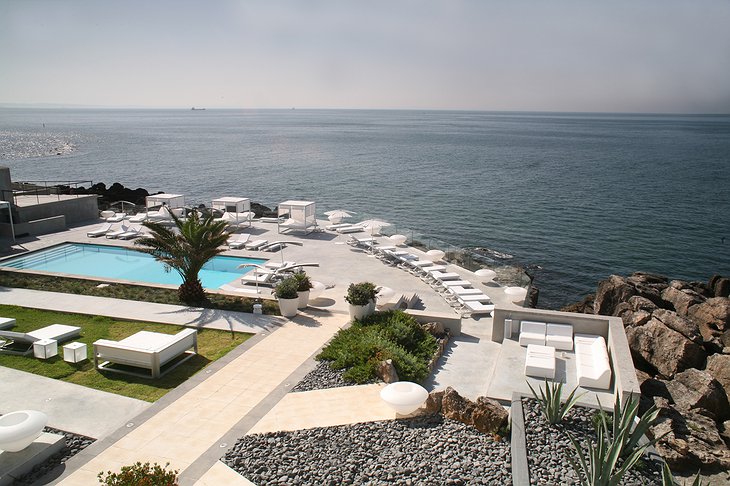 Farol Design Hotel terrace with swimming pool