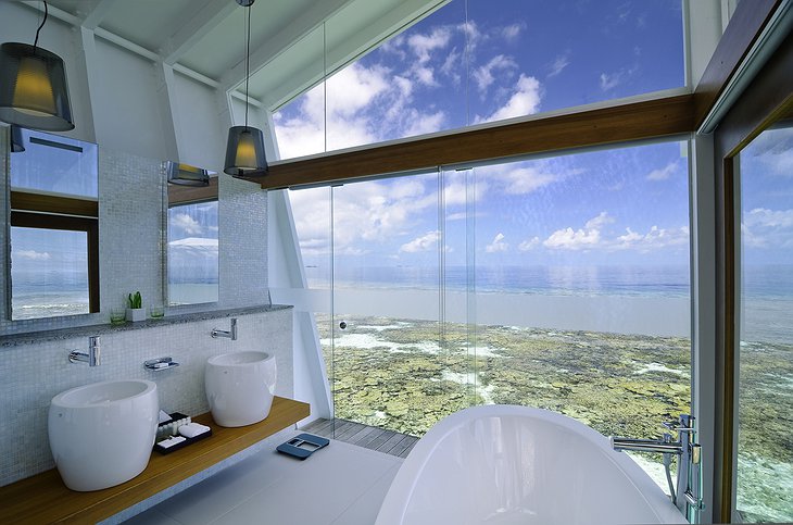 Kandolhu Island water villa bathroom with sea views