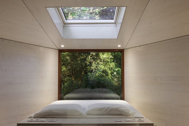 Pedras Salgadas tree house bedroom with forest views