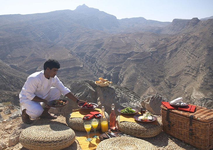 Preparing the meal on the top of the rocky hills of Oman