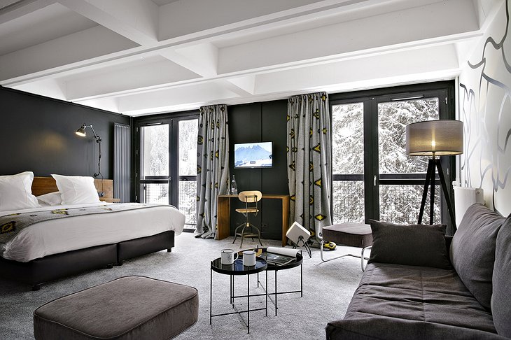 Totem Flaine Hotel suite with snowy nature view from the large windows