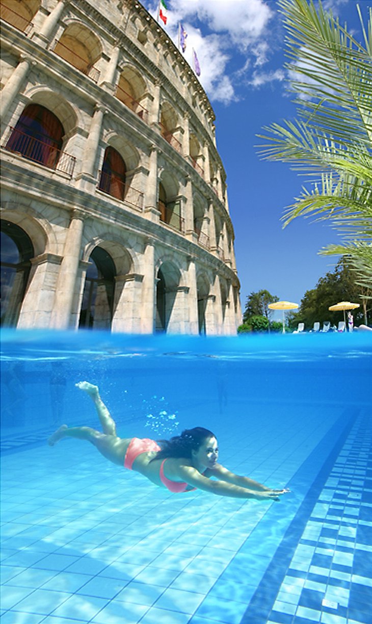 Girl under water in the swimming pool of the Colosseum hotel