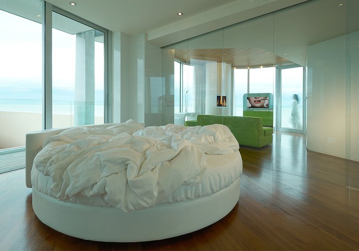 Penthouse suite with rounded bed