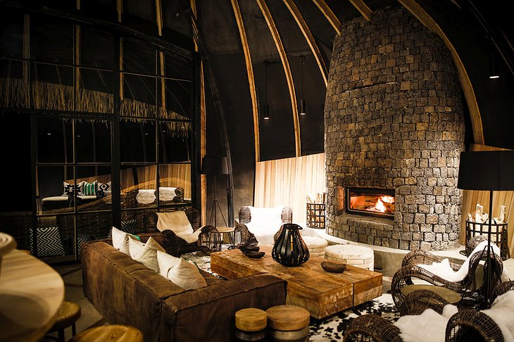 Bisate Lodge cozy interior with fireplace