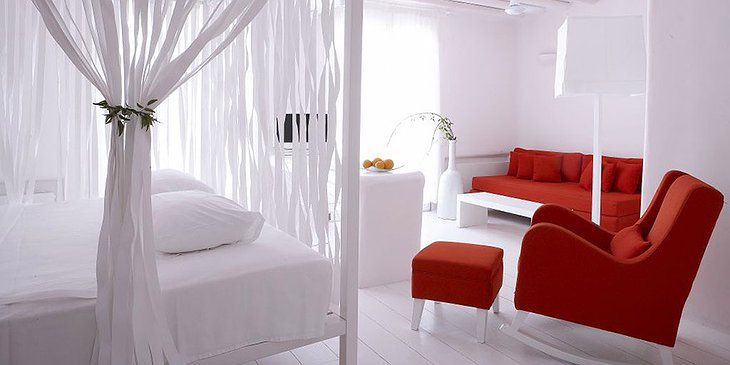 Cavo Tagoo white room with red furniture