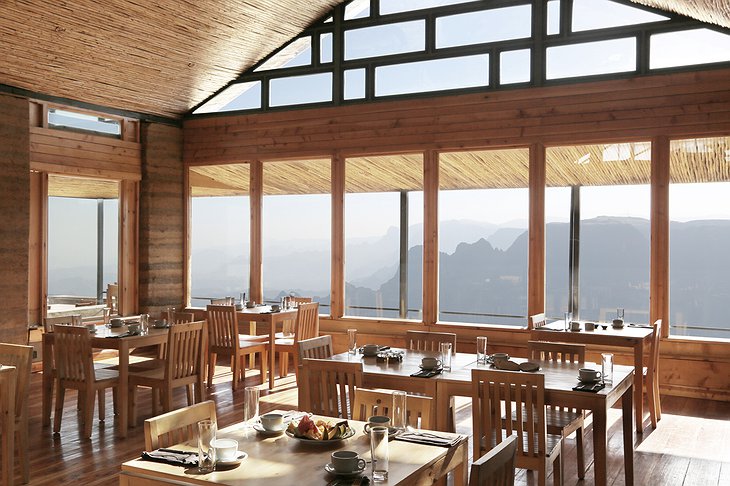 Limalimo Lodge restaurant with huge windows overlooking the mountains