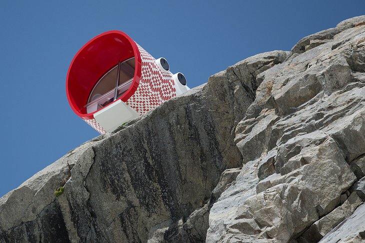 Bivacco Gervasutti on the rocks in the Alps