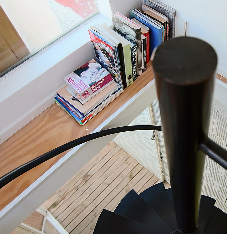 Book shelf at the spiral stairs