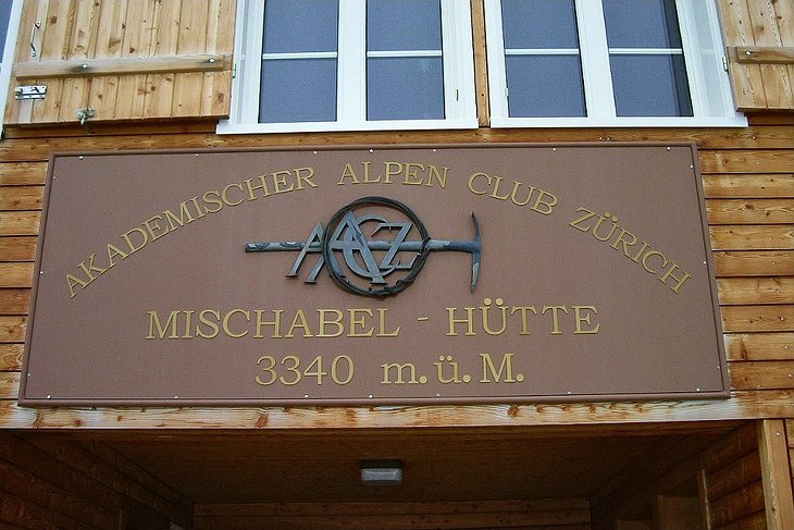 Mischabel Hut entrance sign showing the 3340 meters height where the hotel lies