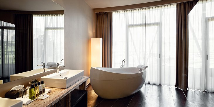 Alpina Dolomites hotel bathroom with design bathtub