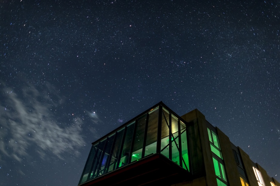 ION Adventure Hotel at night with stars above