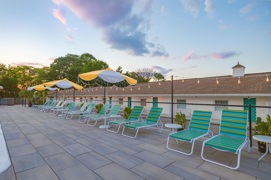 Rye Motor Inn Terrace With Sun Loungers